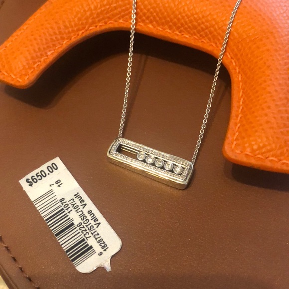 Diamond bar necklace with five moving diamonds. - Picture 3 of 7